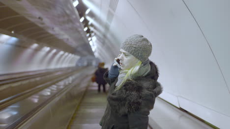 woman on an escalator