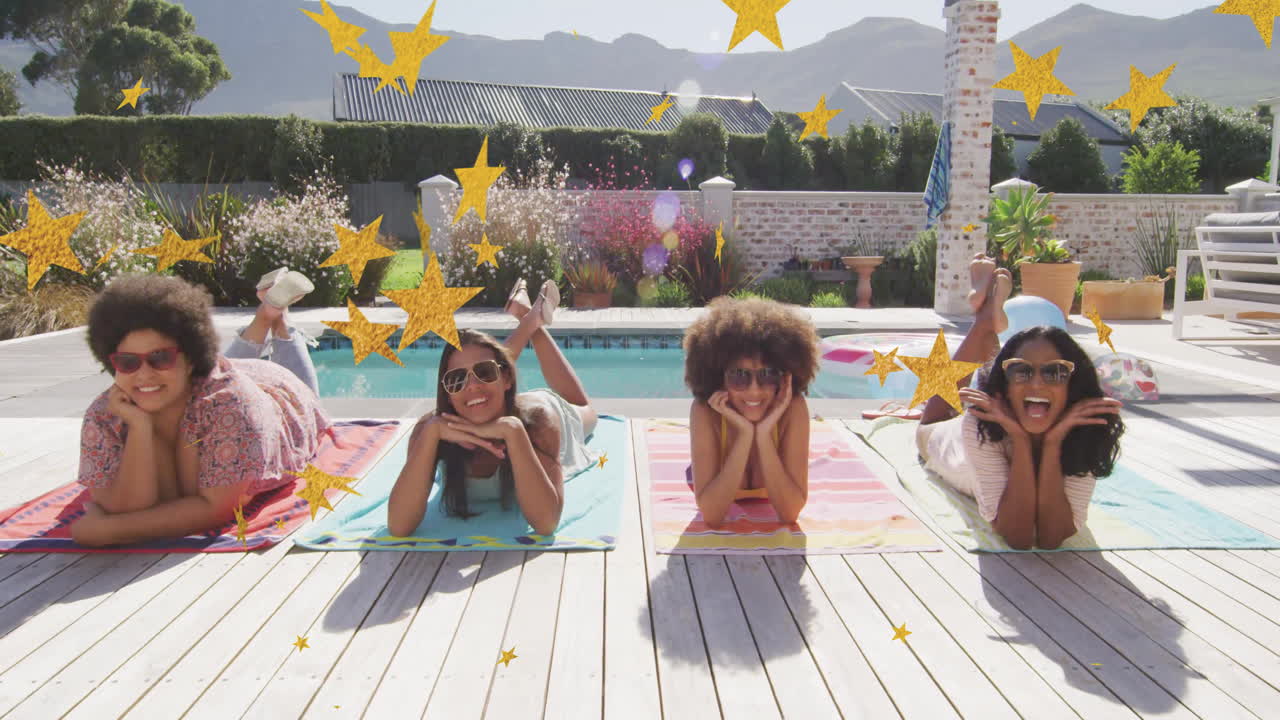 Four people relaxing on poolside deck with star animation overlay