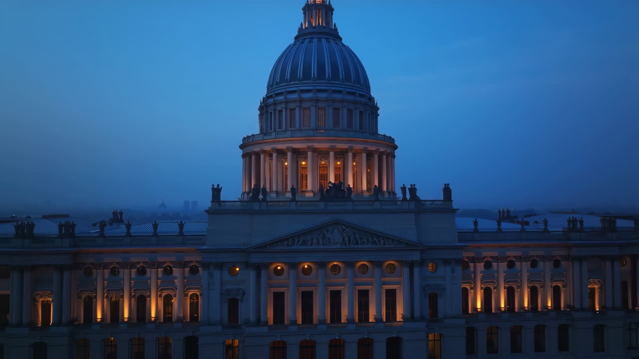 Illuminated Building with Dome at Twilight