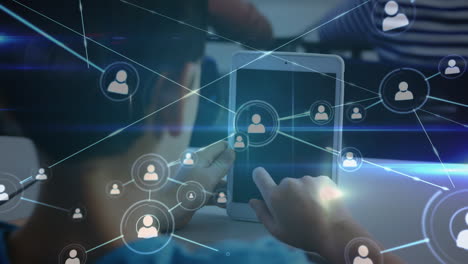 animation of networks of connections over biracial schoolboy using tablet