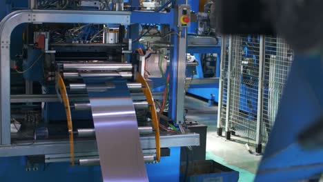 Automatical-machine-rolling-metal-sheet-in-household-appliances-factory