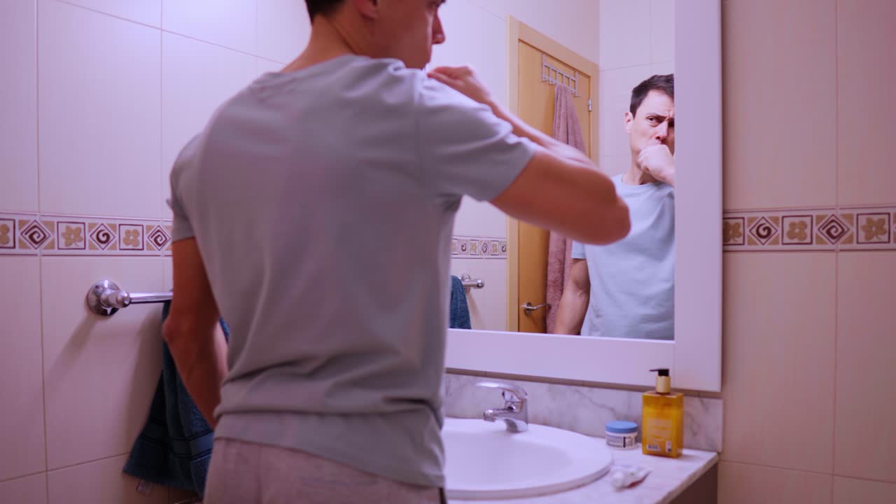 Morning routine of a man taking care of his hygiene
