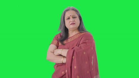 Portrait-of-Confident-Indian-old-woman-standing-crossed-hands-Green-screen