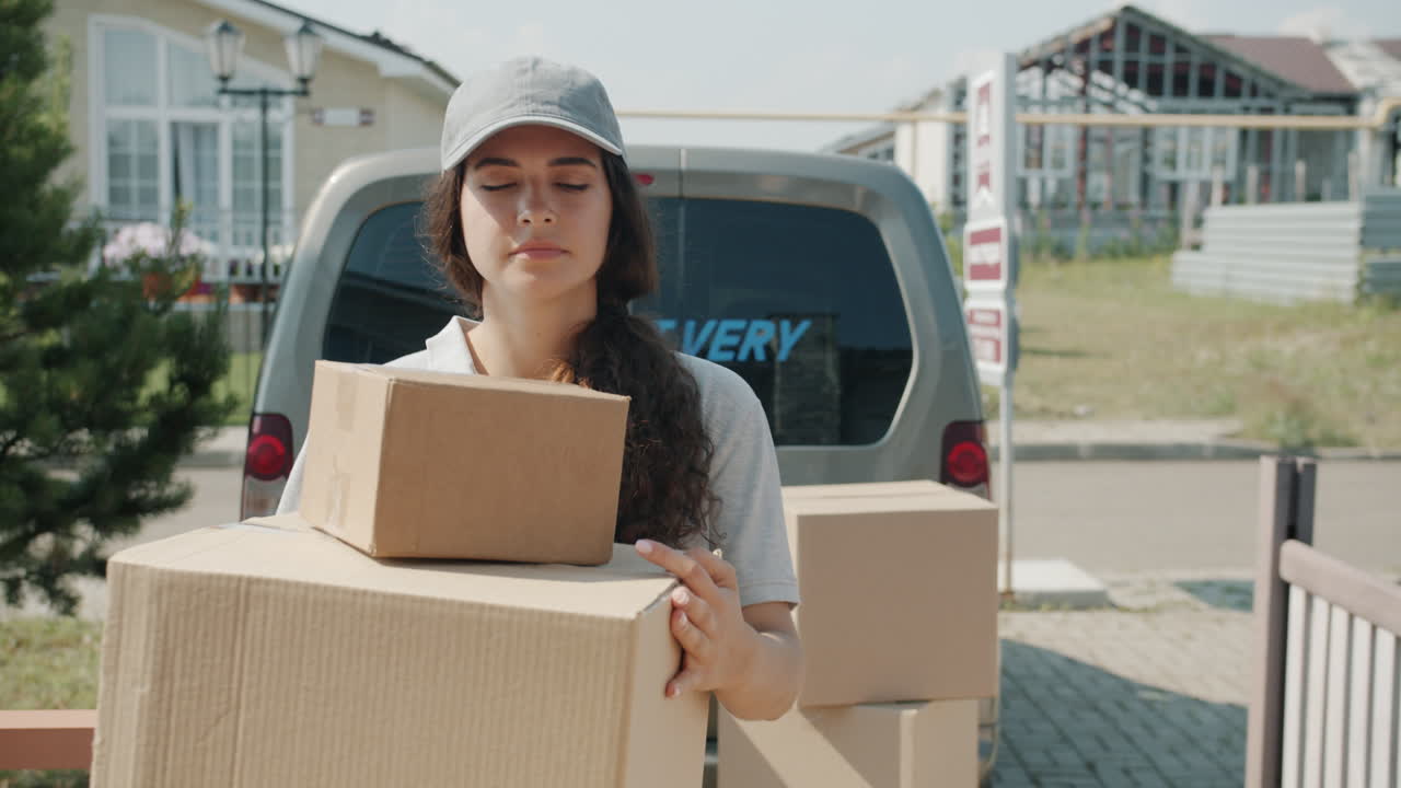 Delivery Person Carrying Boxes