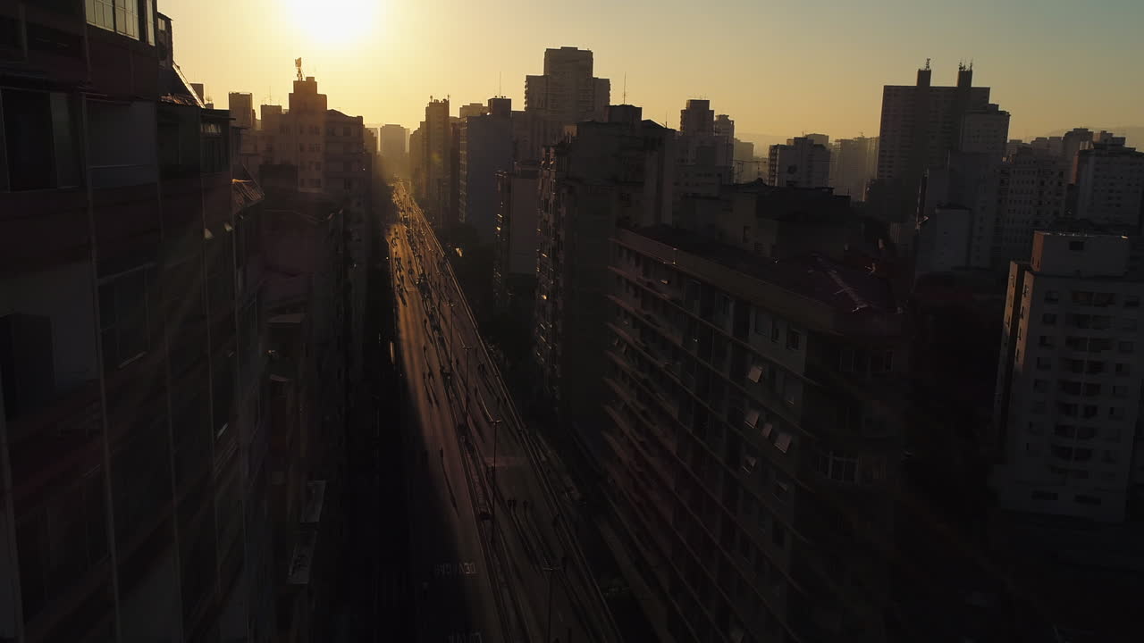 Aerial view to fast track called Minhocao, in downtown, at sunset, Sao Paulo, Brazil