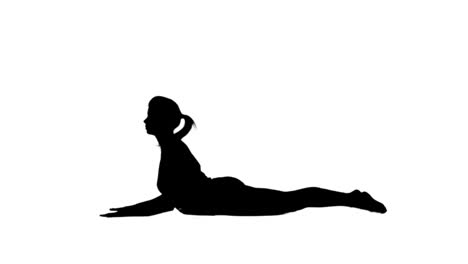 silueta de una mujer haciendo yoga