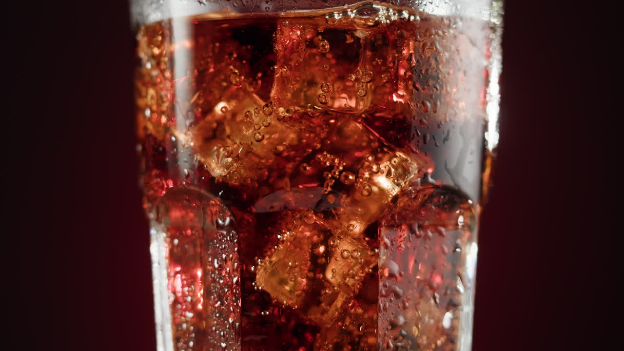 Close-up of a glass of soda with ice