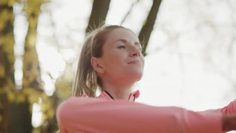 Handheld-video-shows-of-woman-doing-warming-up-exercises