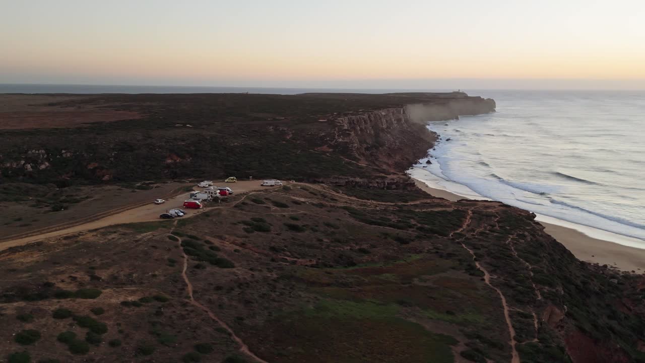 Travelers rest near beautiful coast of Algarve in Portugal, aerial view