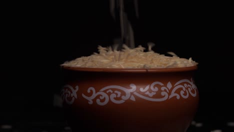 indian rice falling in slow motion