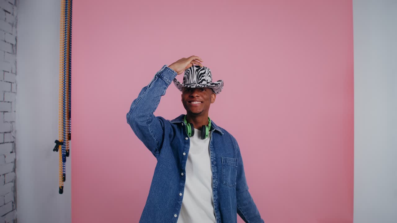 Man Dancing in a Zebra Hat