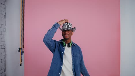 man dancing in a zebra hat