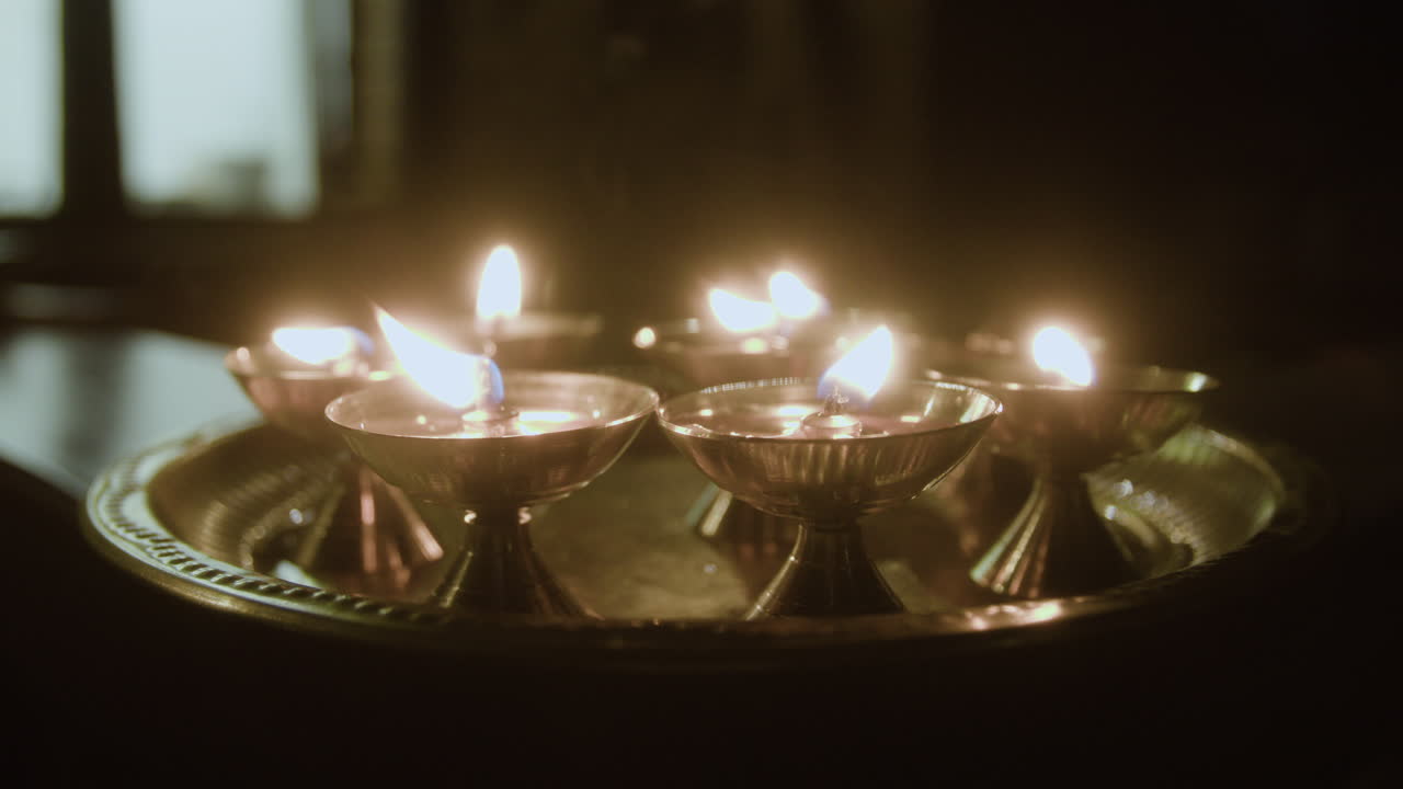 Burning Candles on a Tray