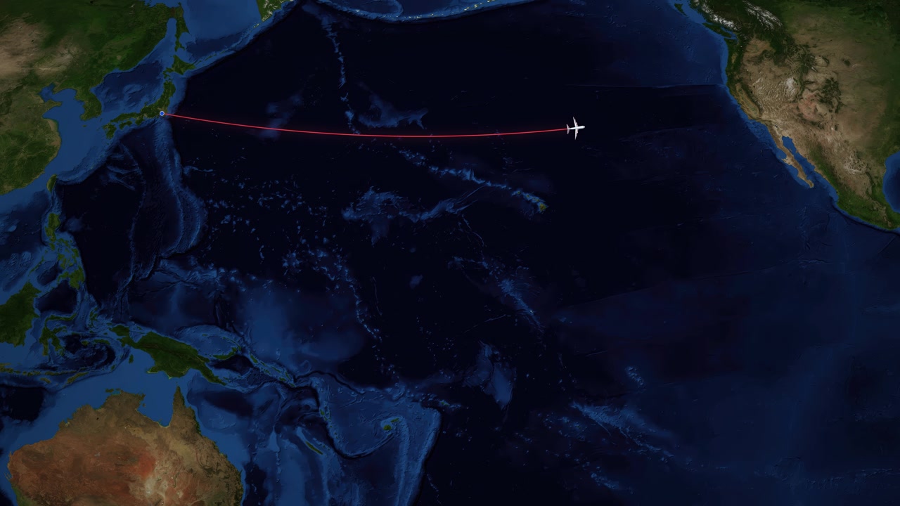 A red line tracks an airplane flying from Tokyo to San Francisco over the Pacific