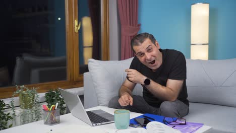 home office worker man looking at camera confused.