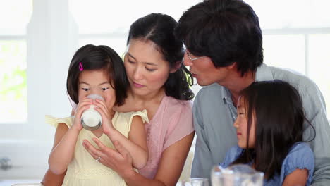 family having breakfast together