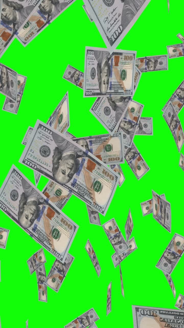 billetes de cien dólares cayendo en la pantalla verde