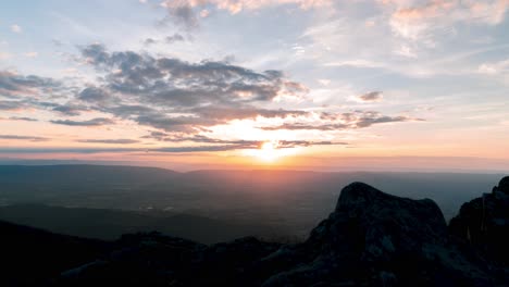 sun setting over the mountains