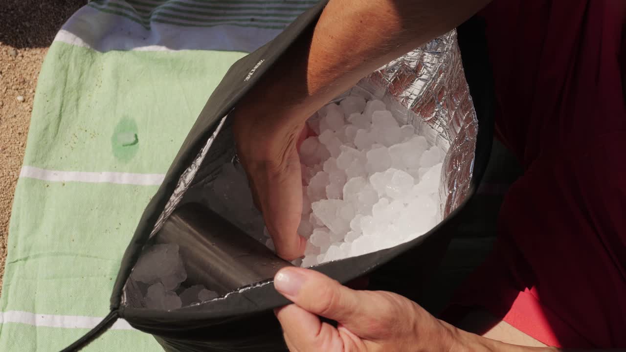 Filling a Portable Cooler with Ice