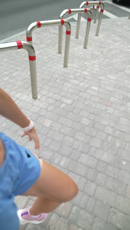 woman stretching knee outdoors