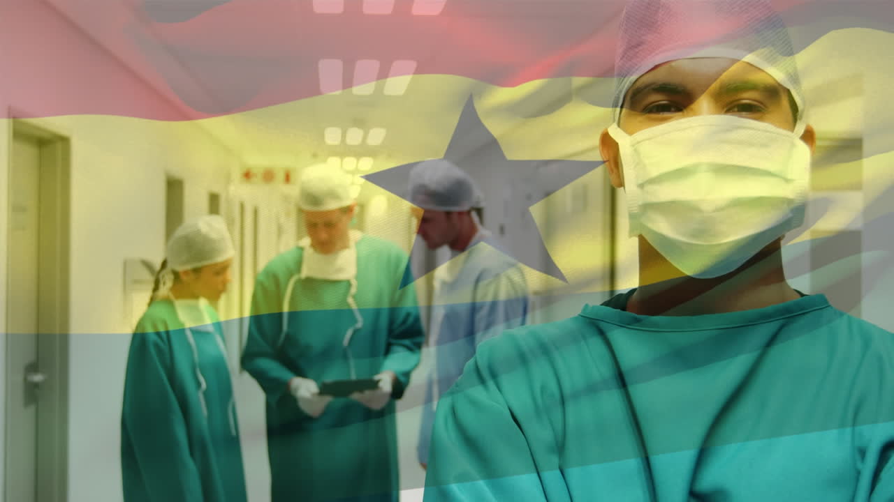 Animation of flag of ghana waving over surgeons in operating theatre