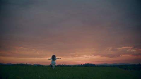 Successful-Woman-Running-Dancing-At-Dusk