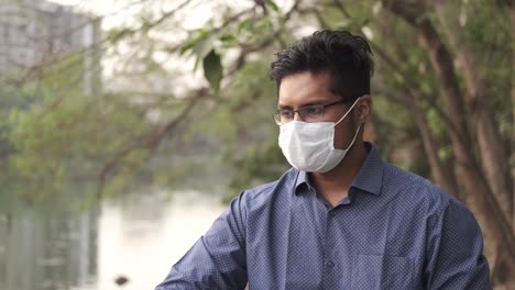man wearing mask in park