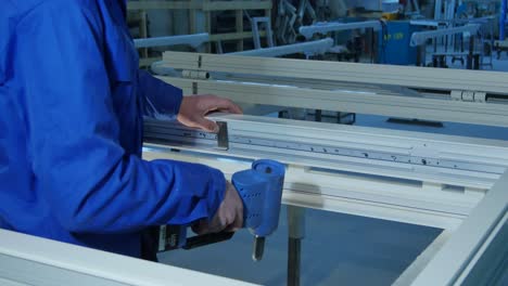 window frame assembly in a factory