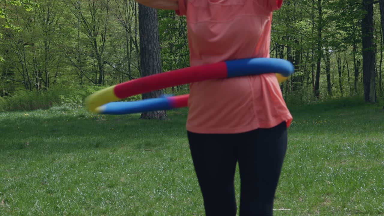 클로즈업 라 후프 운동 배 야외, 라후프 회전 체중 감량을 위해