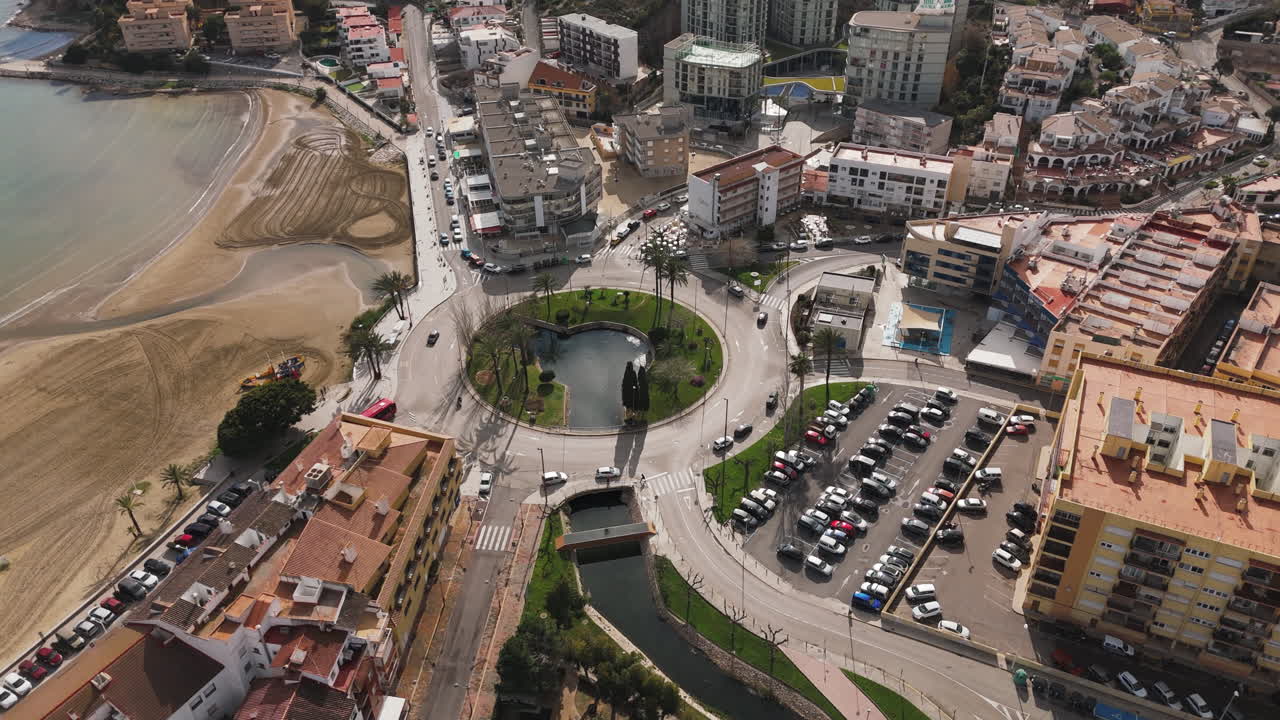 Wide drone angle of Plaça Constituciò and connecting roads leading through Peniscola