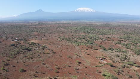 scenic panorama of african savanna and farmland at footstep of mount kilimanjaro