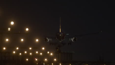 airplane landing at night