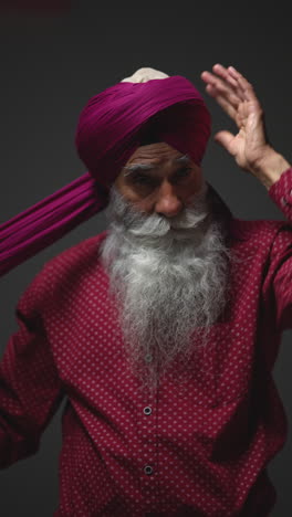 portrait of a sikh man with a long white beard and turban