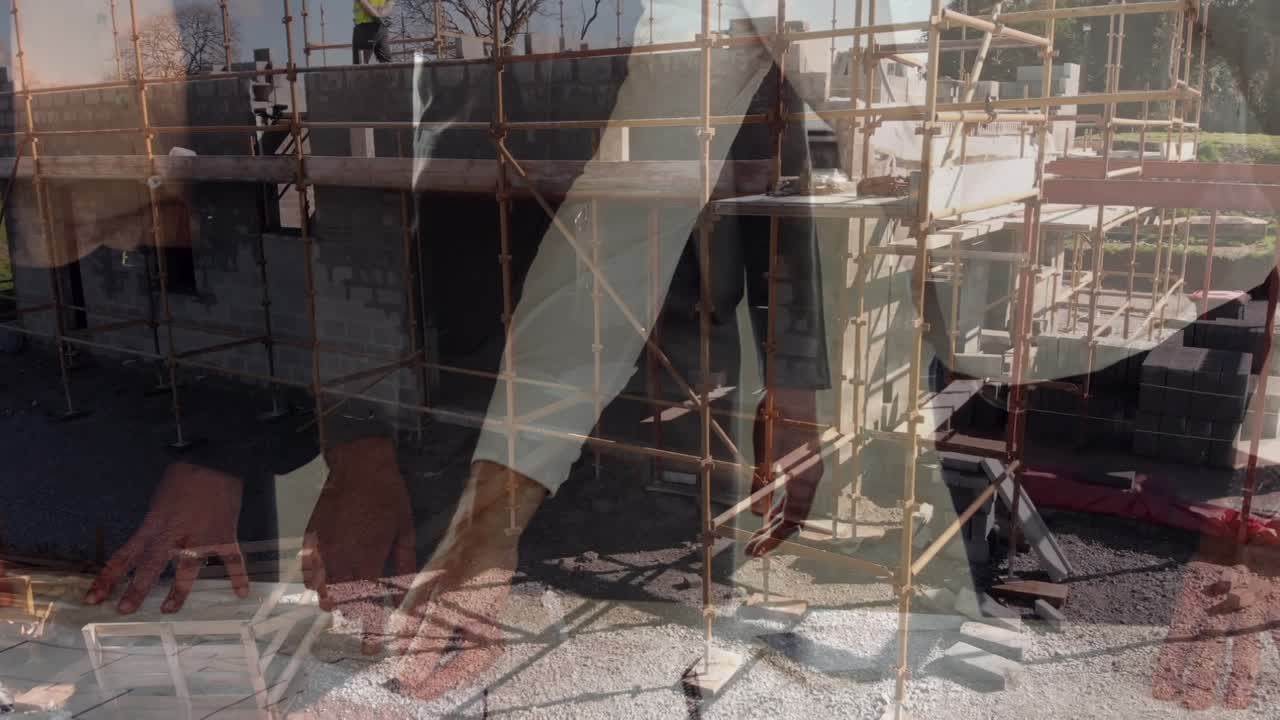 Animation of a construction site over a group of caucasian engineers