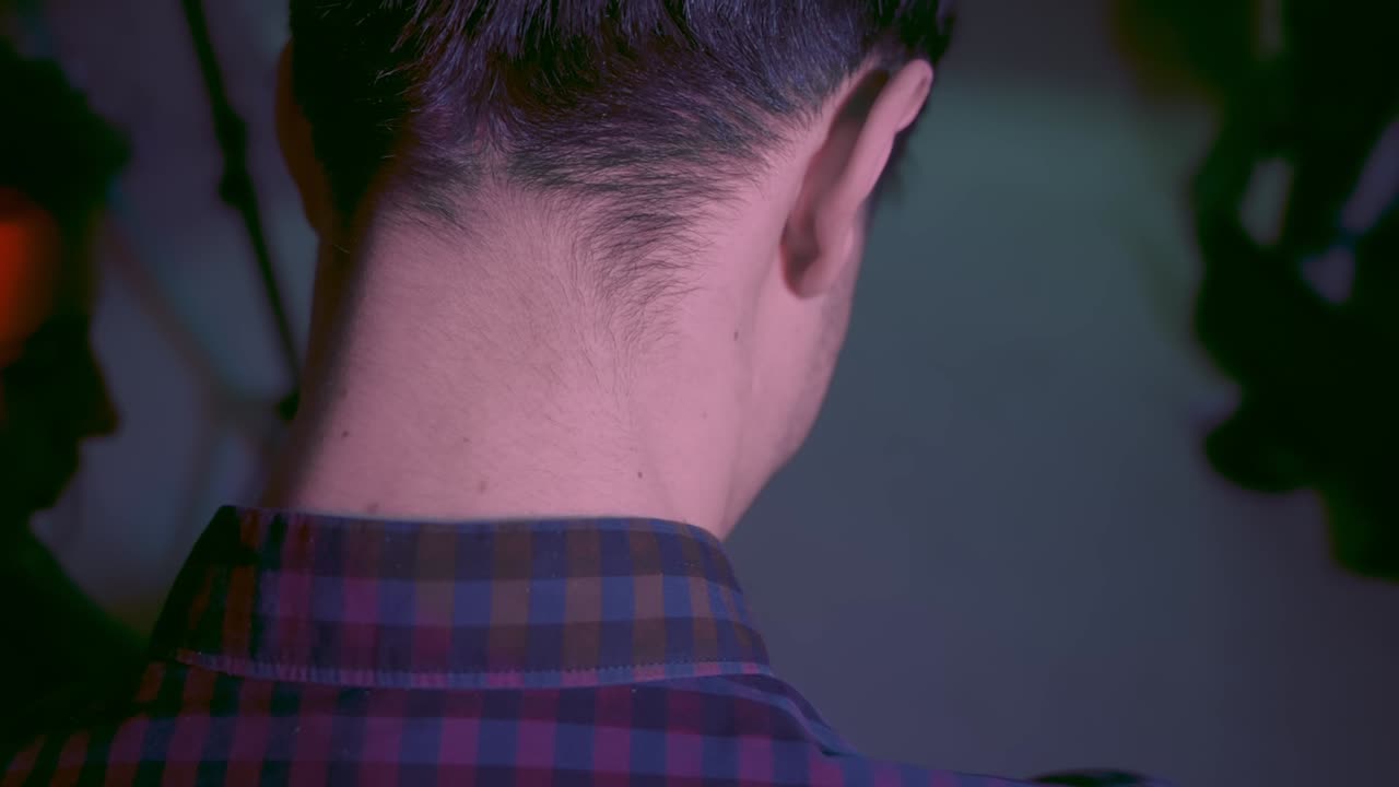 Photographer and a model looking at photos in camera