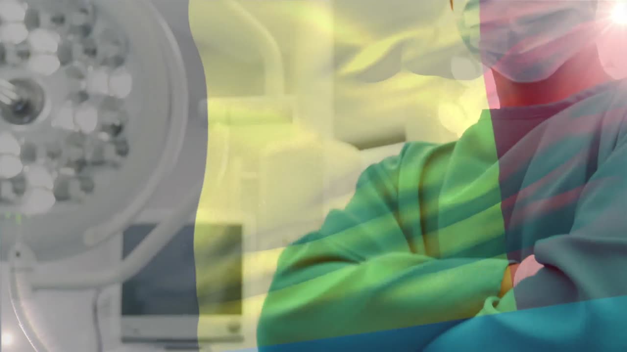 animación de la bandera de bélgica ondeando sobre el cirujano en el quirófano