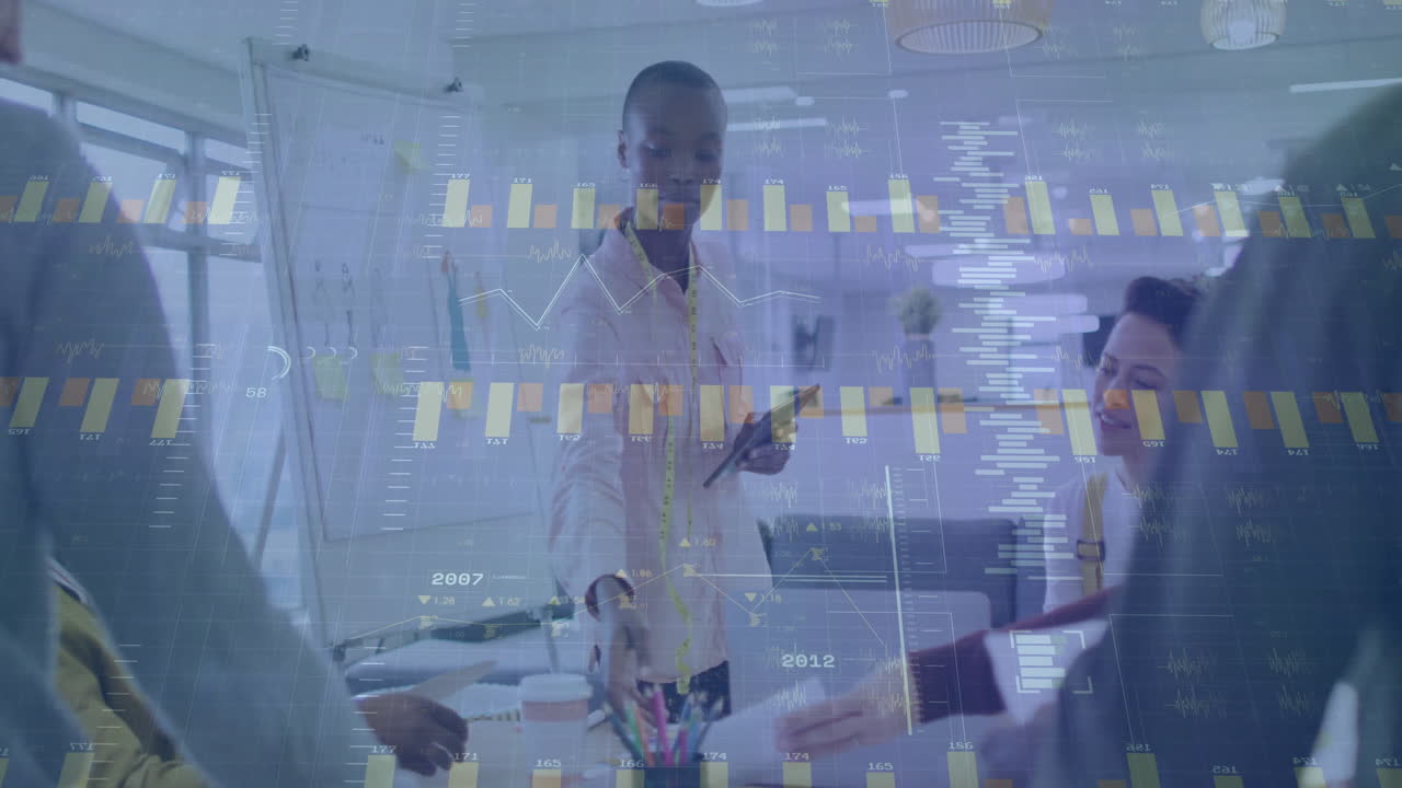 Collaborating in business meeting, diverse team analyzing animated financial data charts
