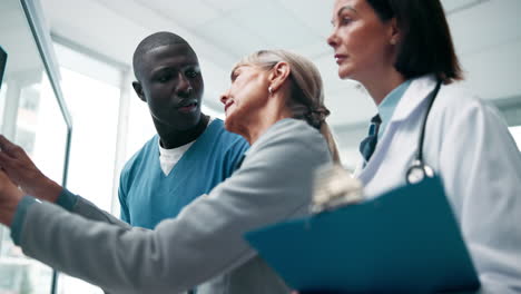 medical professionals reviewing patient data