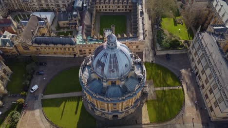 tilt-up aerial reveal over the radcliffe camera and the university of oxford