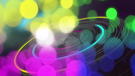 animation of colourful spots over circles moving