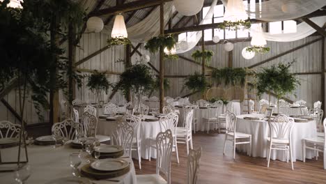 boho vintage wedding venue with stunning lighters and plants