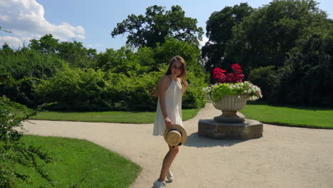 woman walking in a beautiful garden