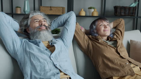relaxed couple on couch