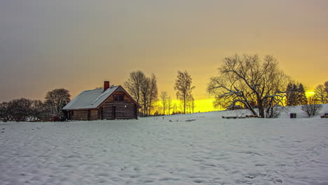 time lapse of wood cottage in snowy countryside