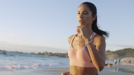 Fitness,-woman-running-and-workout-on-beach