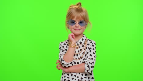 Smiling-pretty-little-stylish-blonde-teen-child-kid-girl-posing-isolated-on-chroma-key-background