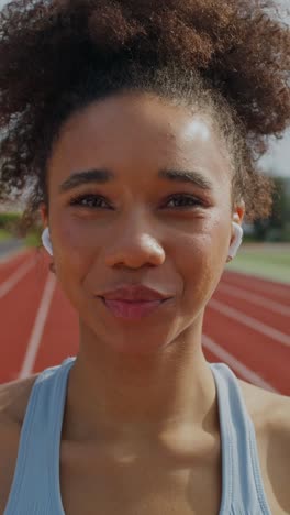 woman exercising on a track