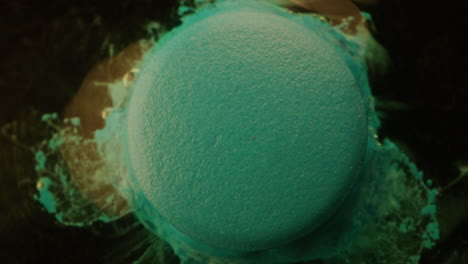 teal circle object with splashes