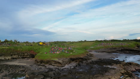 People-Chilling-At-Sunset-Viewpoint-Bar-In-Bali-Indonesia