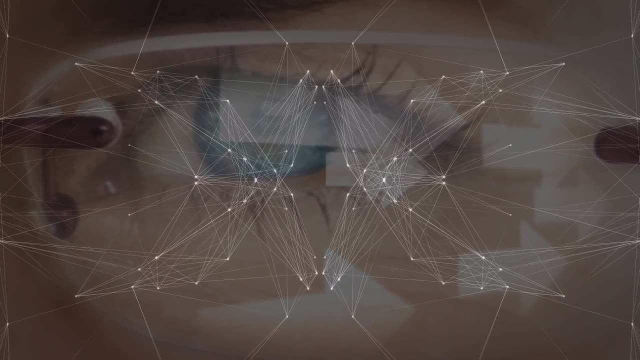Globe of network of connections against close up of a female eye wearing glasses